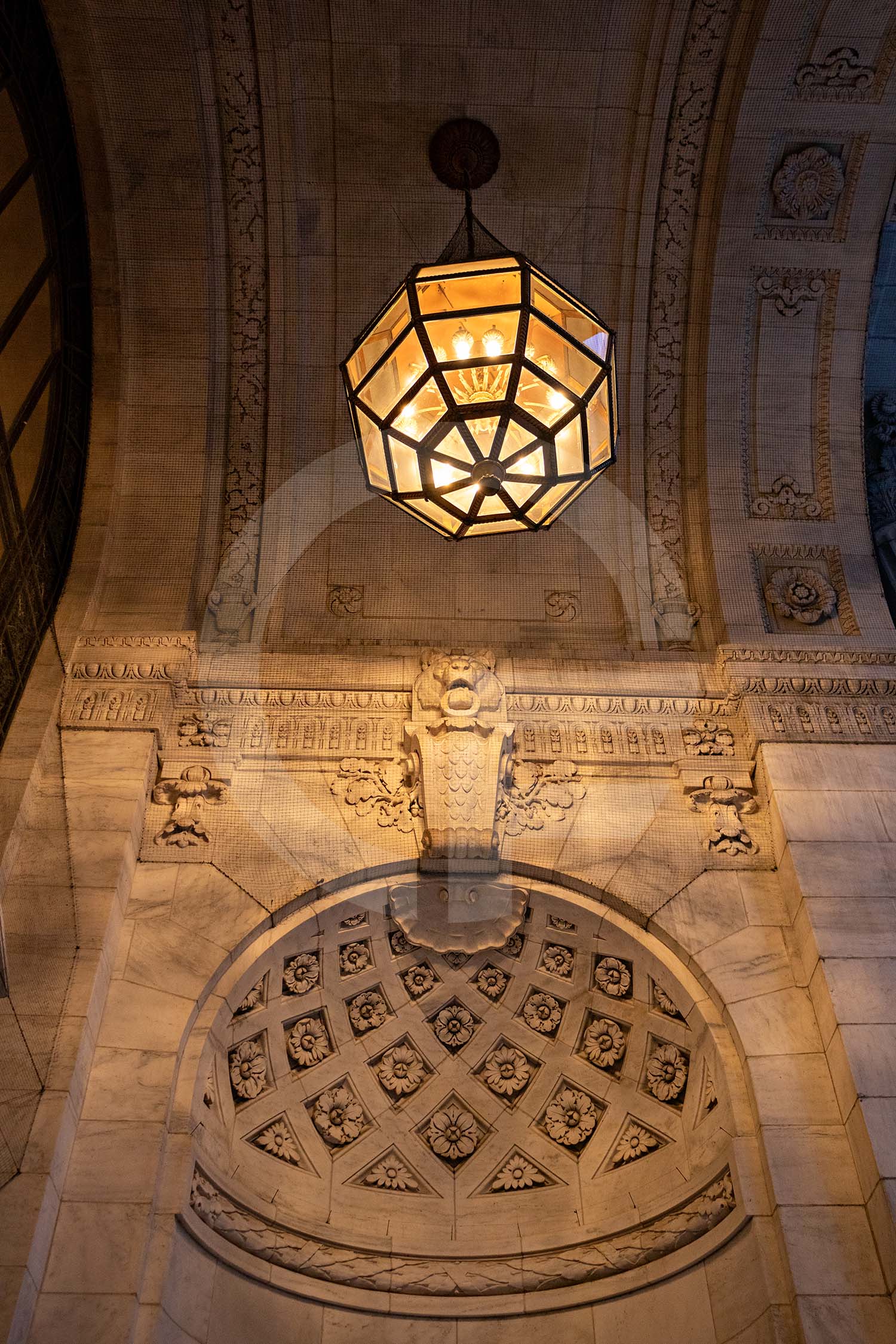 light fixture in a stone arch